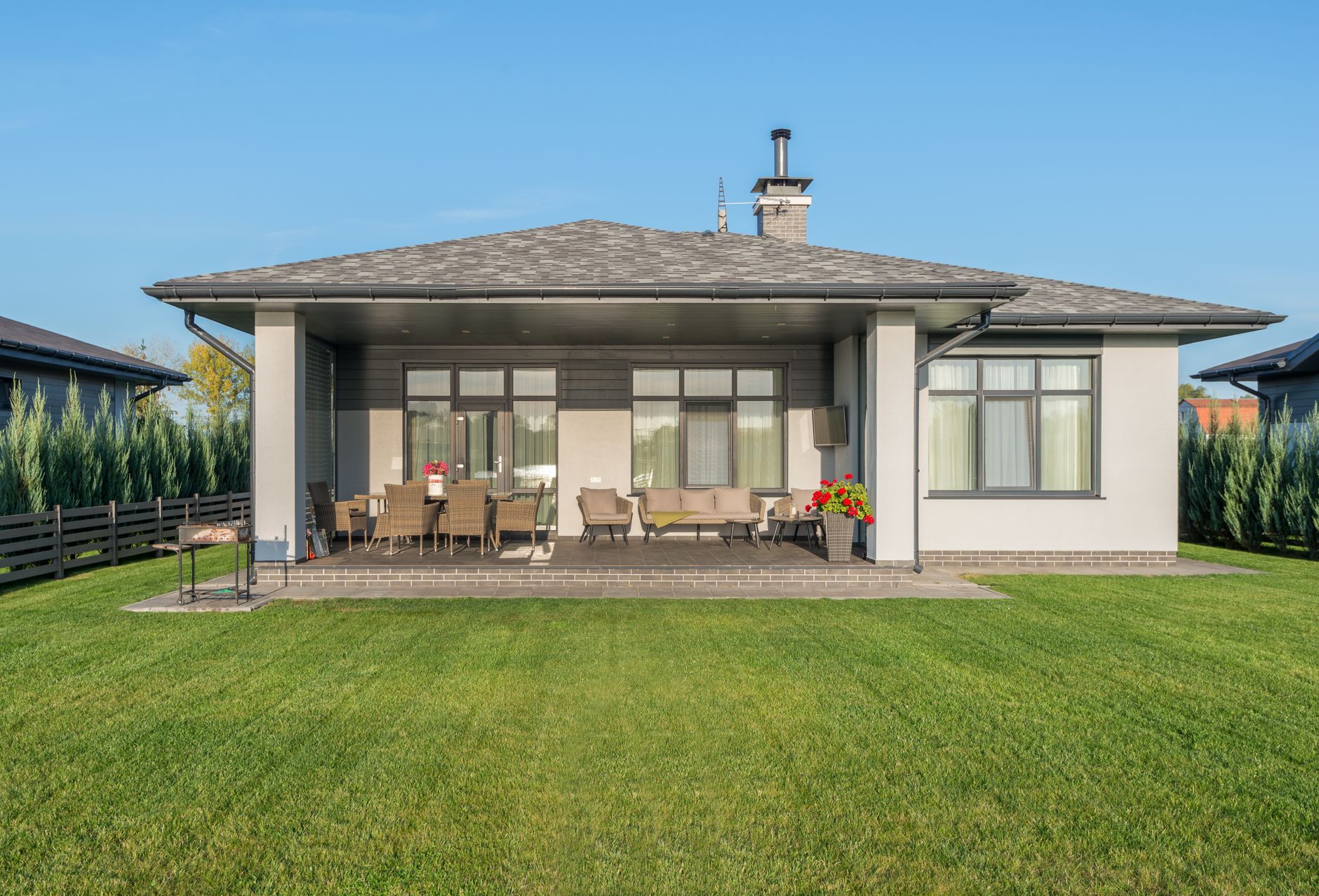Healthy manicured lawn behind a family home